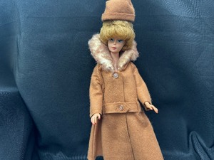 lot 189 image: Vintage Bubblecut Barbie Wearing Its Cold Outside Coat and Hat