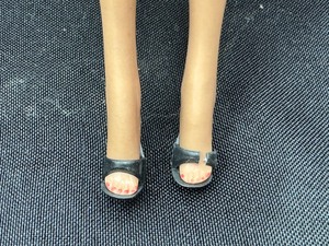 lot 192 image: Molded Head Barbie Wearing Jumpsuit and Belt