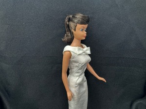 lot 200 image: Vintage Swirl Ponytail Barbie Dark Brunette Wearing White Dress