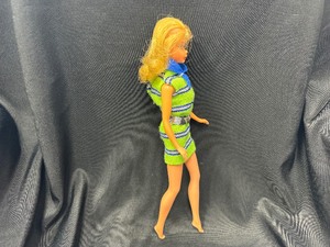 lot 254 image: Vintage Barbie Wearing Now Knit Outfit Bendable Legs