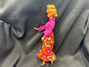 lot 268 image: Barbie Wearing Purple Pleasures Outfit