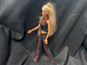 lot 271 image: Long Blonde Haired Barbie Wearing Black Leather Ensemble Bendable Legs