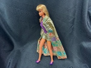 lot 310 image: Vintage Barbie with Bendable Legs Wearing Silver Blues