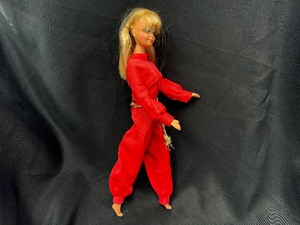 lot 314 image: Vintage Blonde Mod Barbie Wearing Red Pant Suit with Bendable Legs