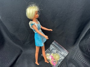 lot 318 image: Vintage Blonde Francie Doll with Hairpieces and Bendable Legs