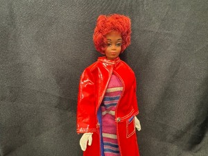 lot 326 image: Vintage Black Barbie Wearing Fashion Shiner Outfit with Bendable Legs