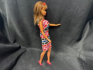 lot 336 image: Vintage Barbie Wearing Print A Plenty Outfit with Bendable Legs