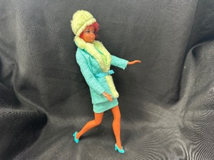 lot 346 image: Vintage Julia Barbie with Bendable Legs Wearing Brr-Furr Outfit