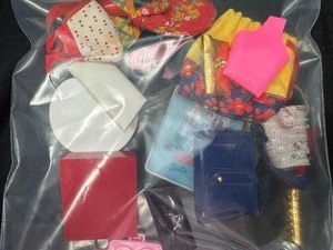 lot 404 image: Vintage Lot of Barbie and Doll Accessories