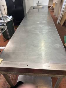 11 Stainless Steel Countertop with Stainless Steel Under Shelf and One Drawer.