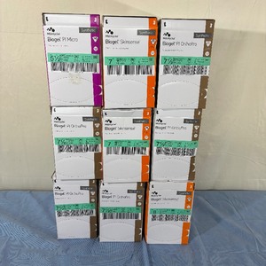 Lot of 9 Boxes (50 pairs each per box) NEW Molnlycke Biogel Polyisoprene Surgical Gloves - Mixed Sizes From 5-12 thru 8 - Expiration 224
