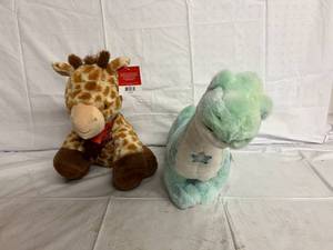lot 186 image: Girraffe and Dinosaur Suffed Animals