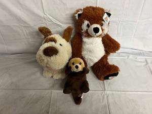lot 190 image: Dog, Red Panda, and Otter Suffed Animals