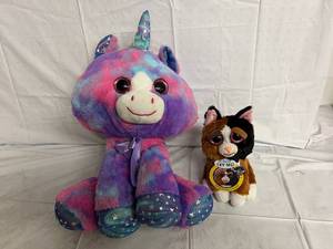 lot 195 image: Unicorn and Cat Suffed Animals