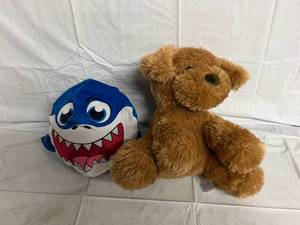 lot 197 image: Baby Shark Toy and Tedy Bear
