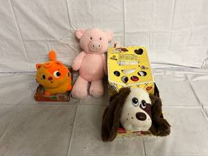 lot 200 image: Cat, Pig, and Puppy Toys