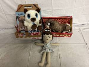 lot 212 image: Cat, Sock Monkey, and Girl Toy