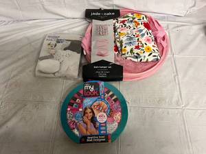 lot 222 image: Hamper, Inflateable Ottoman, and Nial Designer Kit