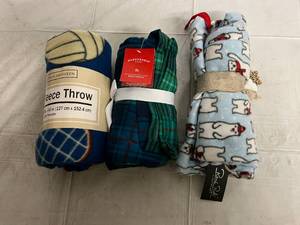 lot 245 image: Throw Blanket, Mens XL Pajama Pants, and Womens L Pajama Pants
