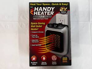 lot 135 image: Handy Heater-Wall Outlet Heater