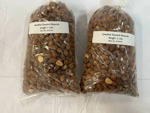 lot 219 image: 2x 2lb Bags Whole Raw Almonds Best by 04302024