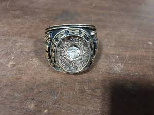 lot 11 image: Herff Jones 2 Class Ring Paperweight