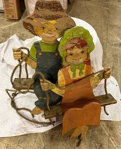 lot 45 image: Swinging Girl & Boy Outdoor Decor