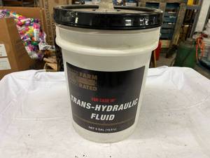 lot 177 image: 12 Full 5 Gallon  Tran-Hydraulic Fluid