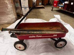 lot 56 image: Radio Flyer Wagon & 2 Wooden Baseball Bats