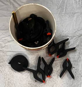 lot 69 image: Bucket full of Clamps & Strapping