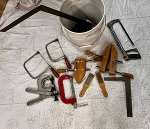 lot 73 image: Bucket of Wood Clamps, Hand Saws, Squares and more