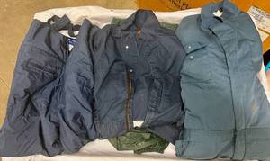 lot 131 image: 2x Coveralls, Snowpants and Raingear Pants