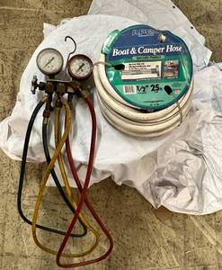 lot 24 image: 12 25 Boat & Camper Hose & Gauges