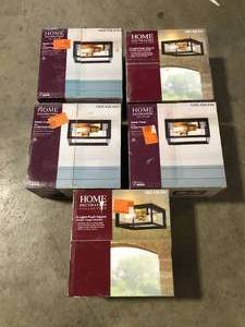 lot 29 image: Lot of Home Decorators Collection Walden Forge 2-Light Black Frame Flush Mount Ceiling Light with Antique Brass Sockets    Customer Returns See Pictures