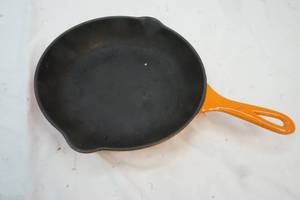 lot 98 image: Cast Iron orange pan