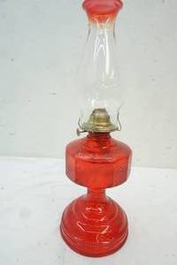 lot 100 image: Red Oil Lamp