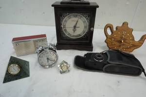 lot 191 image: Variety of Clocks & Canon Camera