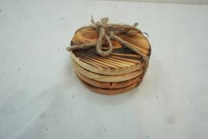lot 199 image: Set of 4 Light Colored Wooden Coasters