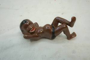 lot 212 image: Vintage Ceramic Boy Figure 4 long Made in Japan