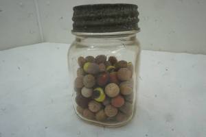 lot 234 image: Vintage Clay Marbles & Regular Marbles in a vintage jar