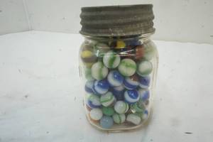 lot 235 image: Variety of Marbles in a Vintage Jar