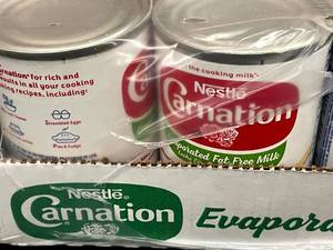 lot 22 image: Fat Free Evaporated Milk 24 X 12oz cans Best By 03222023