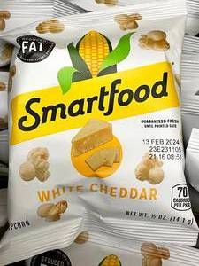 lot 222 image: Large box of white cheddar popcorn bags Best By 02132024