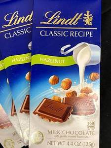 lot 691 image: Lindt Hazelnut Choc 4 Large Bars Best By 05312024