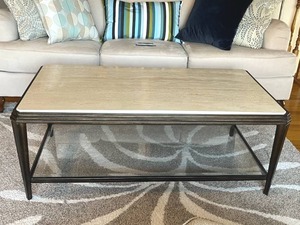 lot 6 image: Delightful Seville Rectangle Cocktail Table with Travertine Marble Top and Glass Shelf (26 x 48 x 18)