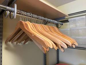 lot 45 image: Lot of 33 Cedar Clothes Hangers in Excellent Condition