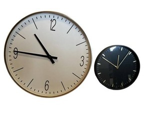 lot 50 image: Pair of Neat Wall Clocks including 10 IKEA Skarig in Excellent Condition