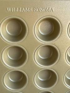 lot 111 image: Variety of Muffin Pans - OXO, Williams Sonoma, and Wilton