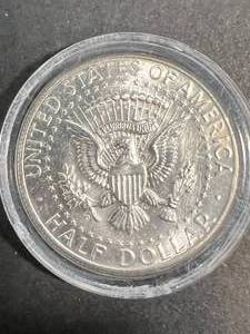 lot 24 image: 1964 US KENNEDY HALF DOLLAR IN AIRTITE