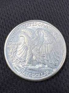 lot 64 image: 1942 US WALKING LIBERTY HALF DOLLAR